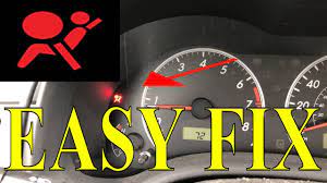 how to fix srs airbag warning light