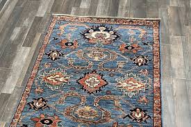 bedroom floor with a fine oushak rug