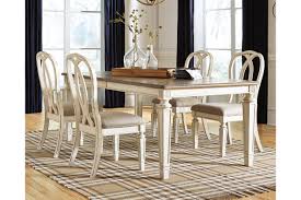 At coleman's furniture finding a dining room set that matches the decor of your home is a given. Realyn Extendable Dining Table Ashley Furniture Homestore