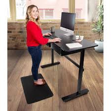 The electric adjustable standing desk is a newer version but the history of standing desks goes all the way back to the 1400s with leonardo davinci not sitting down on the job. Tranzendesk 55 Standing Desk With 2 Drawers Stand Steady