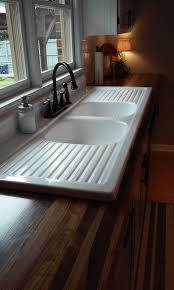 They have great vintage models with all of the modern amenities. Finished Our Wooden Countertops And Installed Our 65 Yr Old Farmhouse Drainboard Sink More Pictures O Rustic Kitchen Sinks Comfortable Kitchen Rustic Kitchen