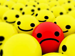 yellow smile and red sad emoticon