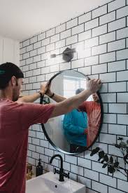 how to hang a mirror on tile or