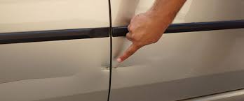 how to prevent car door dings and dents