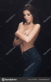 Beautiful Sensual Girl Covering Breasts Hands Posing Isolated Black Stock  Photo by ©VitalikRadko 254314960