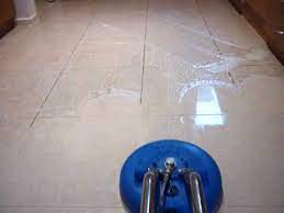remove cloudy film from porcelain tiles
