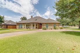 homes with a pool in granbury