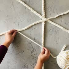 how to make a yarn spiderweb for an