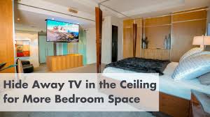 I don't exactly love the look of a tv in the living room (or bedroom, for that matter). Drop Down Tv Lift Transforms Bedroom Entertainment Youtube
