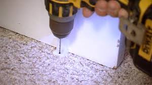 how to drill through carpet without