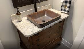 This side table turned vanity is great for smaller bathrooms, or you can do two of them if you need double sinks. How To Make An Unique Bathroom Vanity Kowalski Granite Quartz