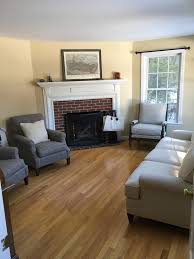 Rug In Room With Corner Fireplace