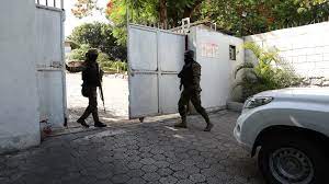 Haitian police battle suspected members ...