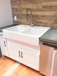 Sinks that are 30 inches wide must sit in a base cabinet of at least 33 inches. Retrofitting A Cabinet For A Farm House Sink Bower Power