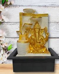 Buy Gold Toned Showpieces Figurines