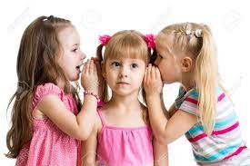 Kids Girlfriends Sharing A Secret Isolated Stock Photo, Picture and Royalty  Free Image. Image 23116915.