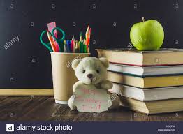 Concept Of Teachers Day Objects On A Chalkboard Background