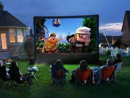 a projector outdoors during the summer
