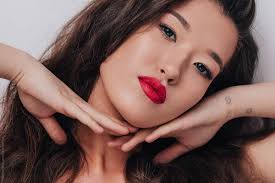 young asian woman with red lips
