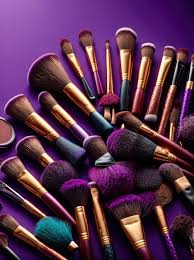 variety of colorful makeup brushes