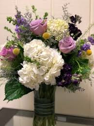 Remove any extra leaves to create clean stems. Lovely Lavender Arrangement Tall Vase In Fairfield Ct Blossoms At Dailey S Flower Shop