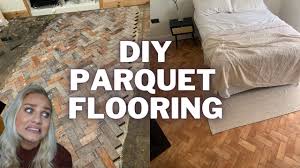 install reclaimed parquet flooring