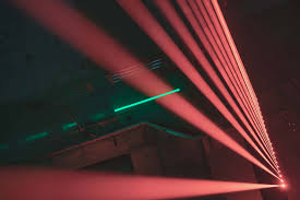 laser beam lighting up a dark room