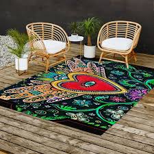 mexican heart folk art outdoor rug by
