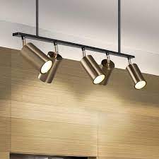 Track lighting systems are versatile lighting solutions that can be used to power spotlights, floodlights, pendant lights or any other fixtures with the proper adapter and voltage. Modern Brass Hanging Track Lights Kitchen Ceiling Lights Track Lighting Kitchen Modern Track Lighting