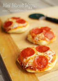 Sometimes we use the pillsbury pizza crust dough and other times, we make our own. Easy Mini Biscuit Pizzas Recipe Cupcake Diaries