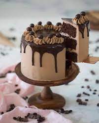 This mocha cake includes two chocolate layers, chocolate frosting, and a mocha mousse between the cake layers. Mocha Cake Preppy Kitchen