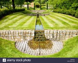A Water Feature Or Rill In An English Country Garden On A
