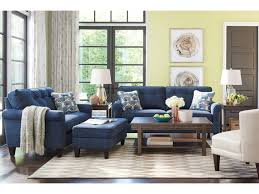 This grouping features a chair with cushioned back, curved arms, oversized cushion seat and flat front aprons. La Z Boy Laurel Oversized Chair And Ottoman Set Conlin S Furniture Chair Ottoman Sets