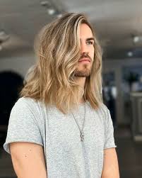 Curly long hairstyle for men; The Best Medium Length Hairstyles For Men In 2021