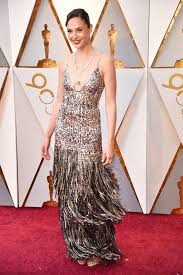 The former miss israel transitioned into acting beautifully, recently earning the coveted role of wonder woman — one of the upcoming films set to break the curse of dc movies. Gal Gadot S Oscars Dress Was Made For Boomerang Not The Oscars Instyle