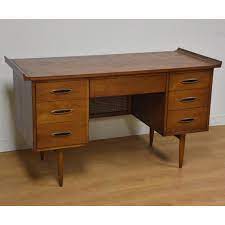 Broyhill doesn't have an online help desk for customer service, but you can call them on the phone. Broyhill Sculptra Walnut Desk Chairish
