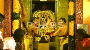 hindu people making puja to pray for
