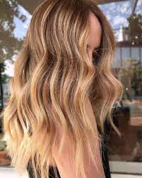 Ever wondered what you'd look like with blake lively's flowing blonde tresses or jessica chastain's ginger waves? 30 Pretty Hair Colors That Ll Get You Excited For Summer 2021 Summer Hair Color Honey Blonde Hair Color Carmel Hair Color