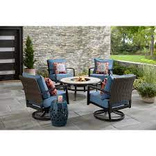 Shop our best selection of fire pit patio sets to reflect your style and inspire your outdoor space. Hampton Bay Whitfield 5 Piece Dark Brown Metal Outdoor Patio Round Fire Pit Seating Set W Cushionguard Steel Blue Cushions 3022 Cm4 The Home Depot