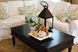 You can fill that tray will all sorts of beautiful items such as candles, pinecones, leaves if it's autumn, seasonal decorations, etc. Cute Coffee Table Ideas Classic Coffee Table Decorations Glass Table Layjao