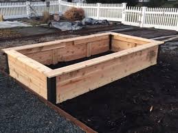 When we built the last raised bed i tried to cut corners on the soil by filling the bottom of the deep beds with branches, leaves and anything else. Aluminum Corner Brackets For Diy Raised Garden Beds Raised Garden Beds Diy Raised Garden Bed Plans Diy Raised Garden