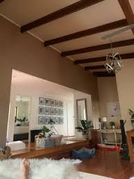 should i paint the exposed beams in my