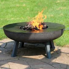 A 0.75 thick cooking grate is firmly welded in place on the upper back and a rounded plate is bolted onto the front. 40 Fire Pit Cast Iron Wood Burning Fire Bowl With Cooking Ledge Overstock 18826409