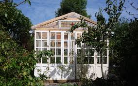 Cost Glass Greenhouse