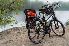 Are bar end shifters good? A touring bike by a river