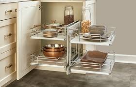 A custom designed kitchen may make use of the corner with a cornered sink. Rev A Shelf