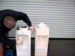 to clean and sanitize a water cooler