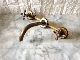 Brass Patina Wall Mounted Faucet With