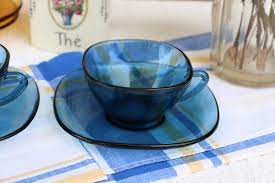 Retro Blue Glass Cups And Saucers