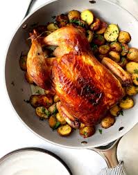 People argue over what starch is used to coat the chicken, about the fat used to fry it, about the temperature at which it cooks. Skillet Roast Chicken With Shmaltzy Potatoes